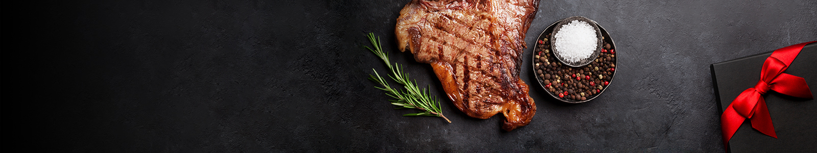 Valentines day or Christmas gift box with wine and grilled steak